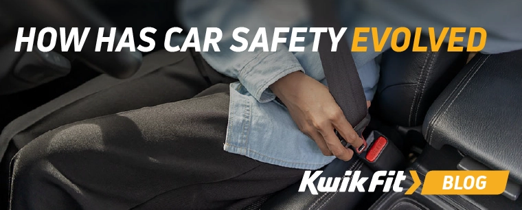 A car dashboard and steering wheel